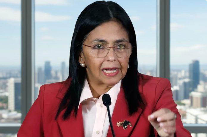 Venezuela's interim president sworn in with support from Maduro's son